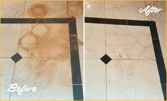 Before and After Picture of a Debary Hard Surface Restoration Service on a Marble Floor to Eliminate Rust Stains